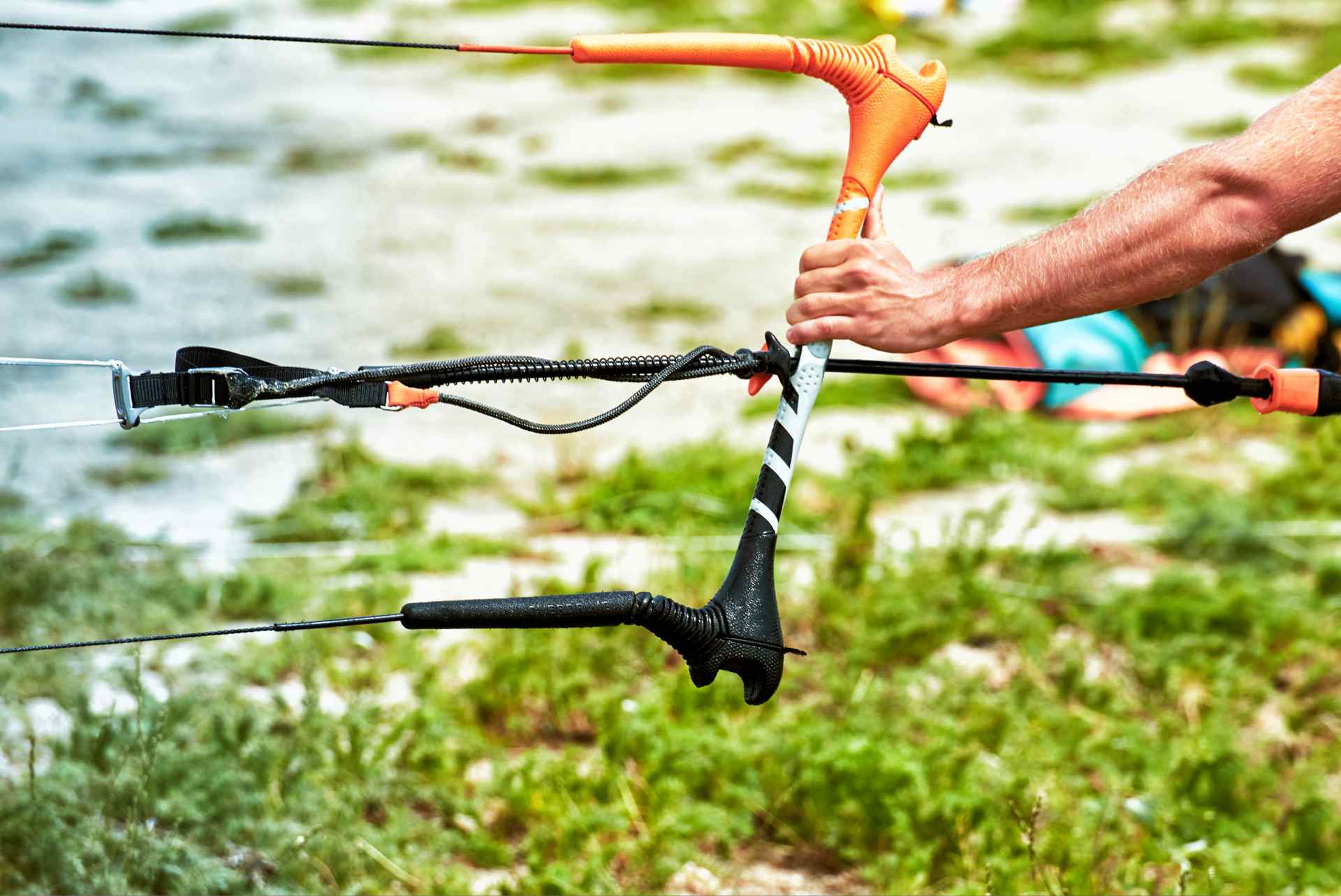 A close-up of a bowfishing setup featuring a compact bow with adjustable draw weights and durable lines, ideal for targeting fish in various aquatic environments.